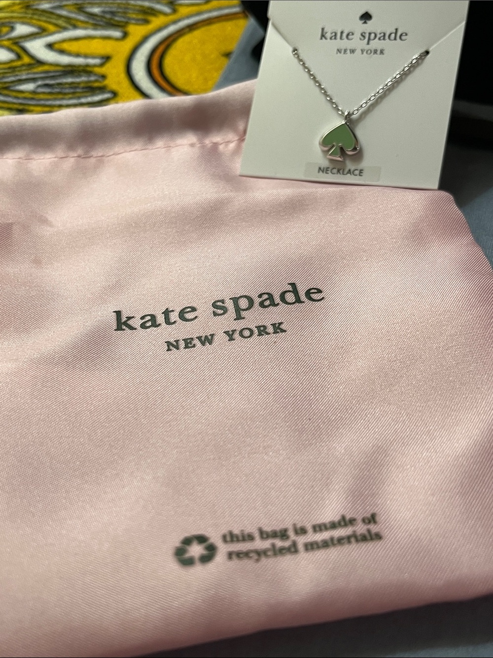 🌞kate spade silver necklace with green spade charm and pink pouch